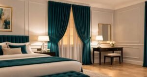 Winter Home Decor Ideas featuring an elegant bedroom with teal curtains, cozy bedding, and warm lighting.
