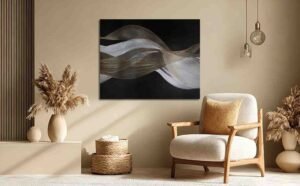 Modern living room with abstract wall art, cozy accent chair, woven baskets, and neutral decor.