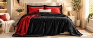 Budget Bedroom Makeover featuring black and red bedding, a cozy upholstered headboard, warm lighting, plants, and stylish modern decor.