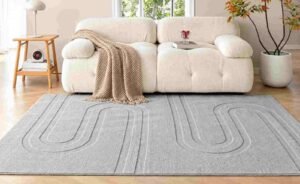 Modern living room with a cozy sofa, textured rug, and stylish Living Room Items.