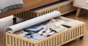 Small bedroom ideas featuring a rolling under-bed storage drawer.